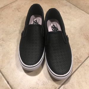 Black leather vans slip ons